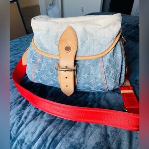 Louis Vuitton Monogram Denim Sunshine PM Lt Blue/ red strap shoulder bag.